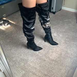 Only wore once thigh high black stilettos. Size 8